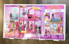 barbie pink passport doll house