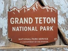 VINTAGE GRAND TETON PORCELAIN SIGN OLD NATIONAL PARK SERVICE NPS WYOMING CABINS