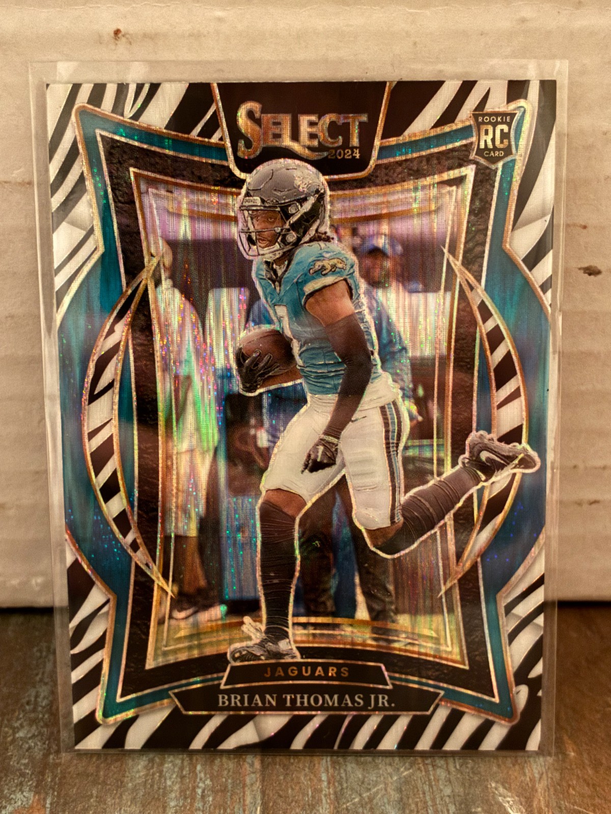 2024 Panini Select Concourse Brian Thomas Jr. #91 Zebra Shock Prizm Rookie (SSP)