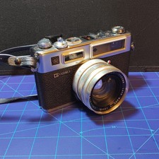 Vintage Yashica Electro 35 GSN 35mm Film Camera 45mm F1.7 Japan Works Spiderman