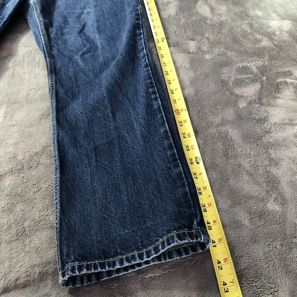 Jeans slim fit Tommy Hilfiger lavagem média azul denim 38x30 algodão casual preppy - Imagem 4 de 4
