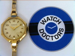 garrard watch gold
