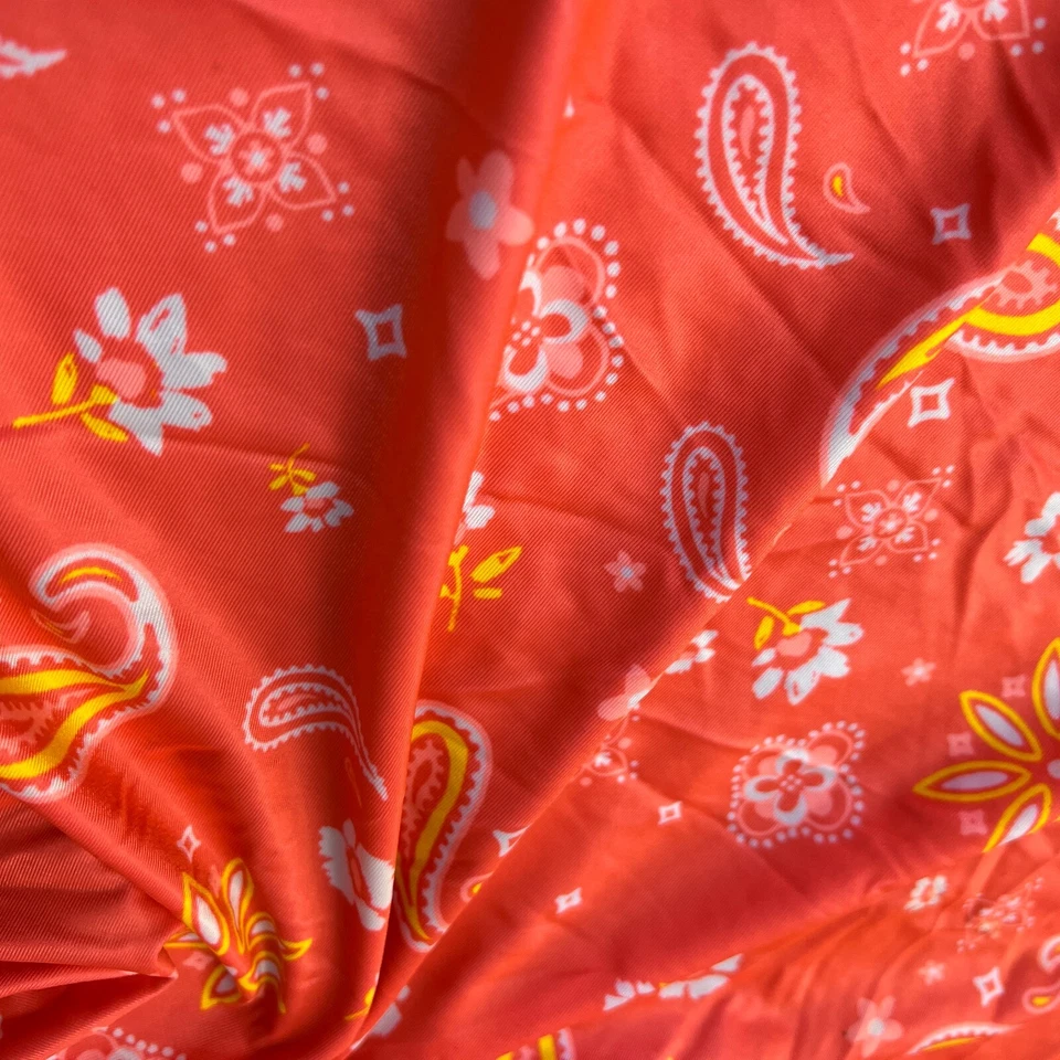 Tela de spandex de nailon con estampado naranja de cachemira y flores de diseño elástico de 4 vías Foto 2 de 4
