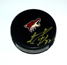 Louis Domingue Phoenix Coyotes Autographed Hockey Puck  A3724