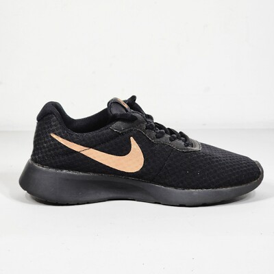 nike tanjun black gold