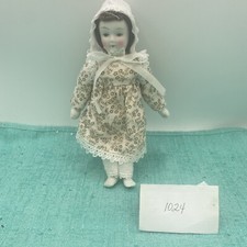 Vintage Porcelain Doll/Head,feet Hands. 7 and 1/2 Inches Tall With Bonnet