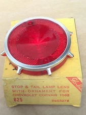 1962 Chevrolet Corvair tail light lens with ornament GLOW BRIGHT NOS