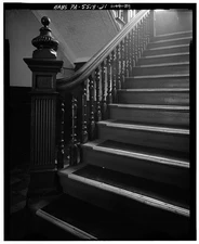 21. FIRST FLOOR: DETAIL OF STAIRS, BALUSTRADE, AND NEWEL POST IN MAIN ENTRYWAY