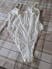 Cream Lace corsett type Body suit Size L