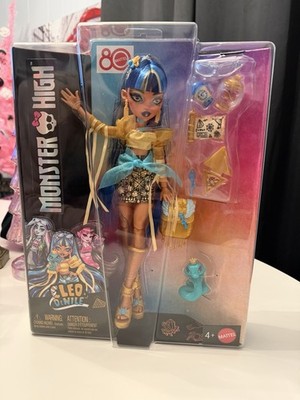 Monster High Cleo De Nile Fashion Doll in Golden Shirt with Pet Hissette and Acc