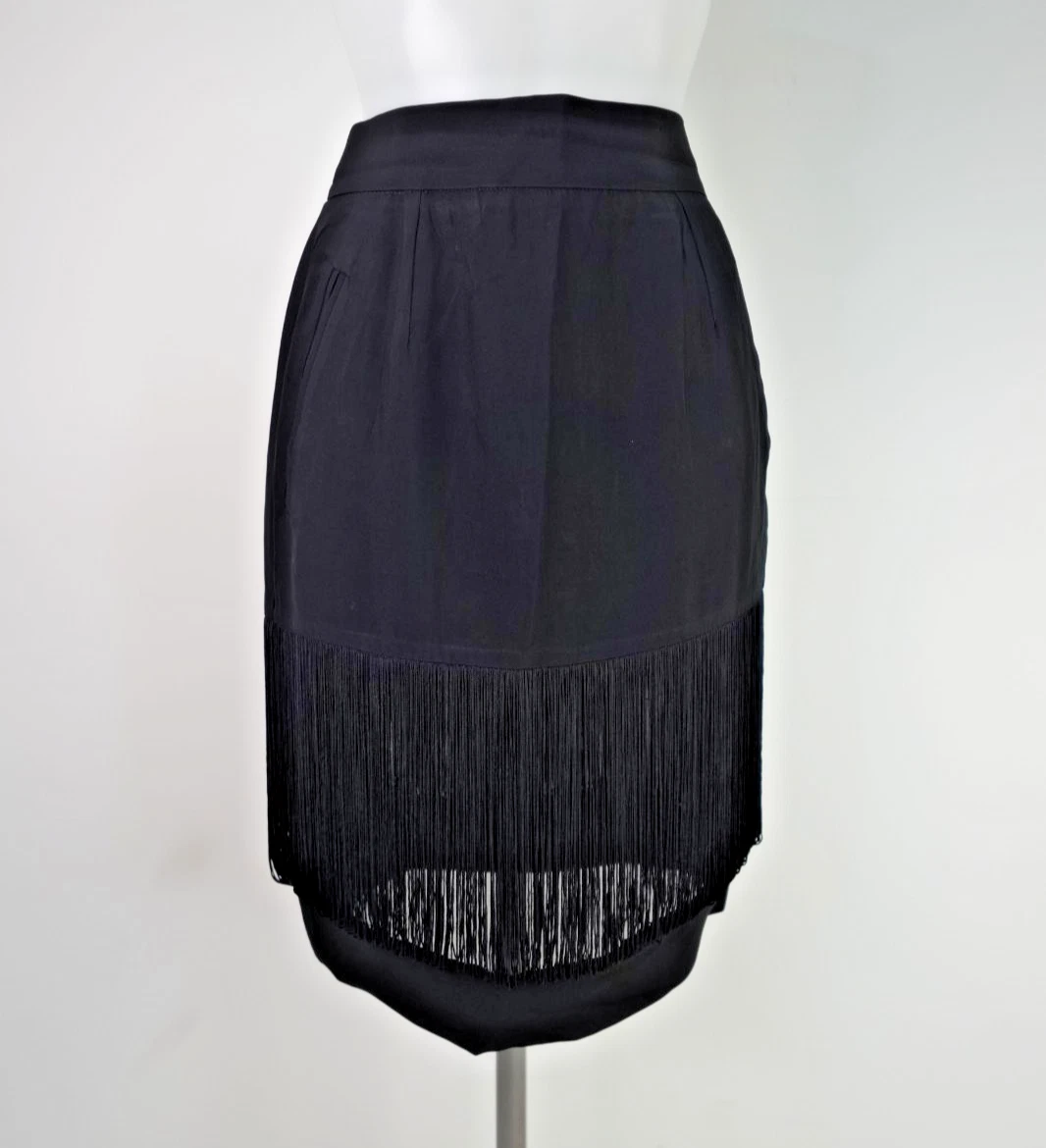 Jupe crayon noire Alaïa Vintage, €497 |  | Lookastic France