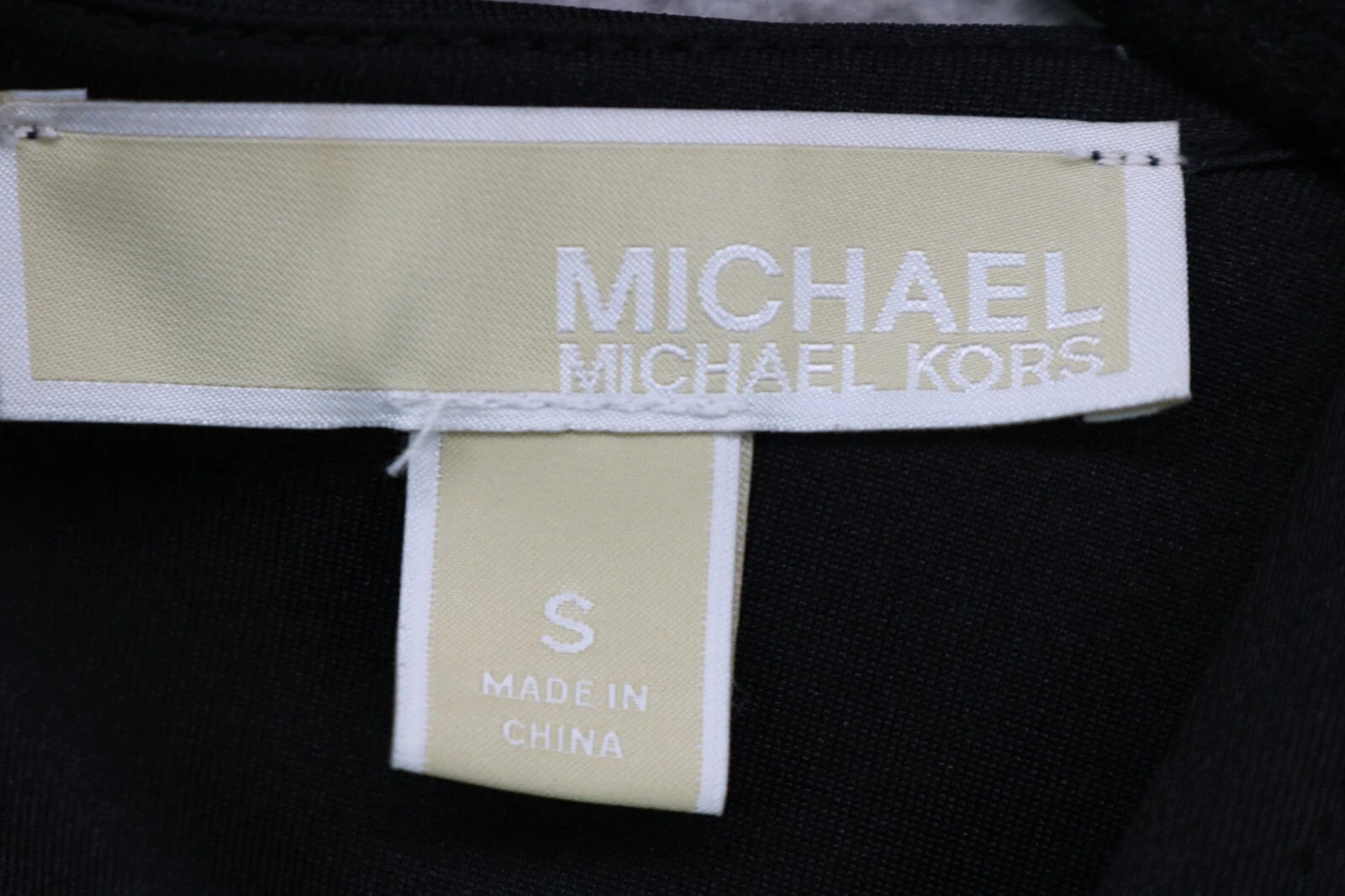 Abito Michael Kors nero scollo a V subacqueo manica corta taglia small