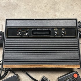 Atari 2600 Console With 2 Joysicks with 7 classic Games Tested & Working Great. 