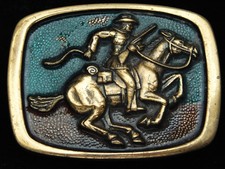 QG01171 NOS VINTAGE 1970s  COWBOY RIDING HORSE  ART SOLID BRASS BELT BUCKLE