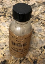 1950S Worldwide Super-fine Typewriter Oil In Bottle 3 Inch Tall thumbnail