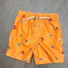 NWOT Carter's 24mo Orange Swim Shorts with Nautical Design. Offers welcome 