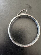 Sterling silver baby bangle. Approx six inches in circumference.