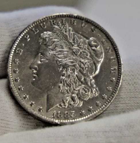 1885 O US Morgan Silver Dollar $1 AU (Cleaned)