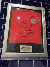 1966 Signed World Cup England Shirt x 9 players. Framed + COA from Our Price Plc