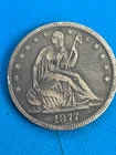 1877 seated liberty half dollar VG to F