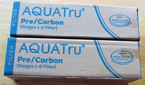 AquaTru: 2 boxes Pre/Carbon Filters, 1 Box Descaling Kit, 1 packet Descaling Kit