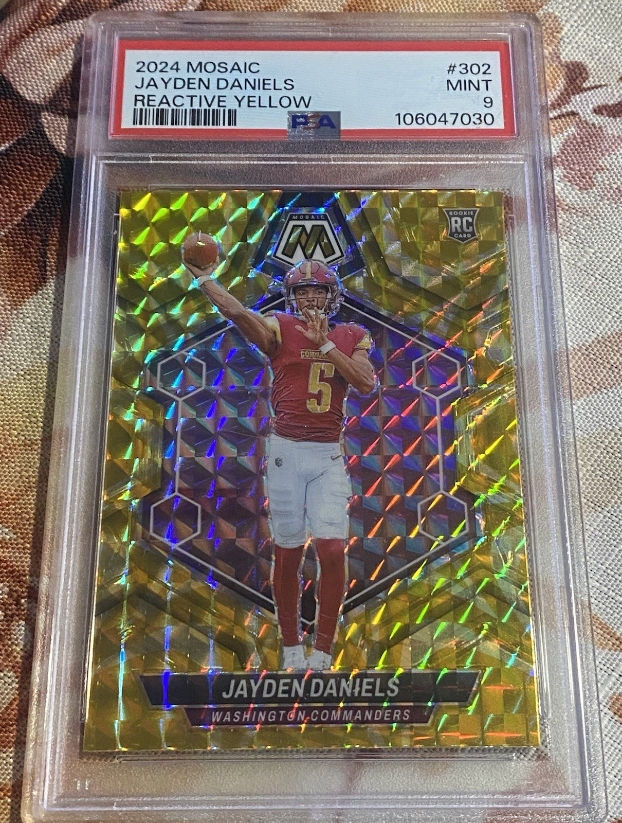 2024 Panini Mosaic Jayden Daniels RC #302 Reactive Yellow PSA 9
