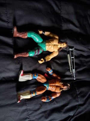jakks ultimate warrior and custom Jake the snake 