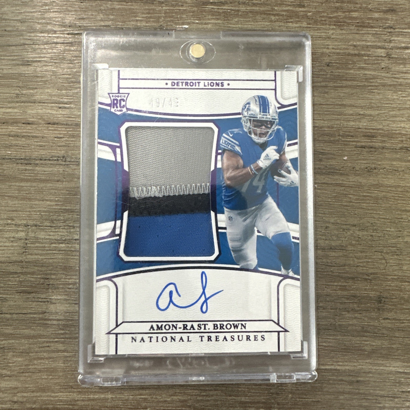 2021 National Treasures Amon-Ra St. Brown #183 Purple RPA 49/49 - Bookend