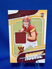 2024 Absolute - Absolute Rookie Materials Luke McCaffrey #ARM-LMY (Mem, RC)