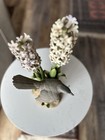 Porcelain sculpture titled 'Catbird with Hyacinths' by Boehm — photo 5