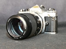 Nikon FE Silver 35mm SLR Film Camera w/ Nikkor 135mm f/2.8 Lens  Case - TESTED