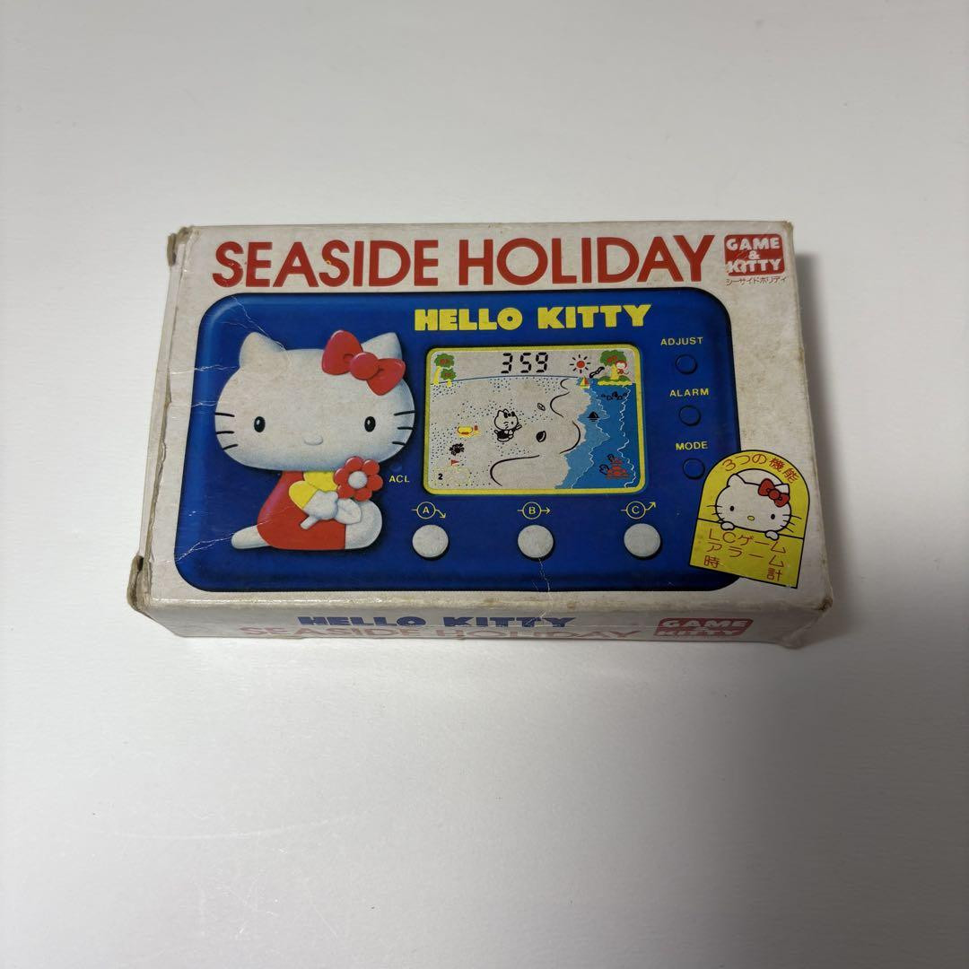 1976 Vintage Hello Kitty Seaside Holiday Game Watch by TOMY