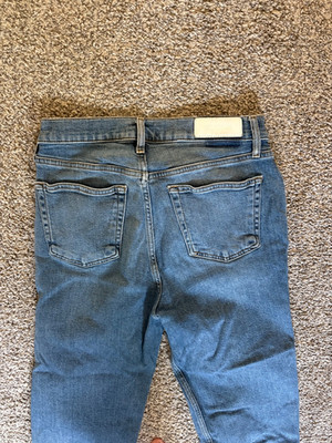 ReDone Jeans (Size 29). Medium wash, stretch and soft material. Frayed pant cuff