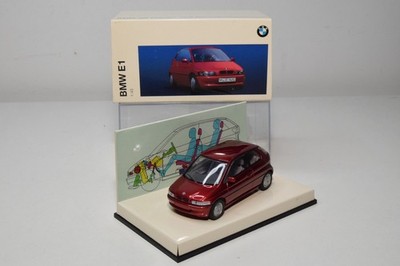 B69 1:43 MINICHAMPS BMW E1 MET. MAROON DEALER BOX MIB 2
