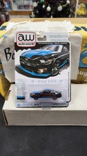 NIB 2024 2015 FORD MUSTANG GT PETTYS GARAGE MODERN MUSCLE AUTO WORLD 1/64 R1 4B