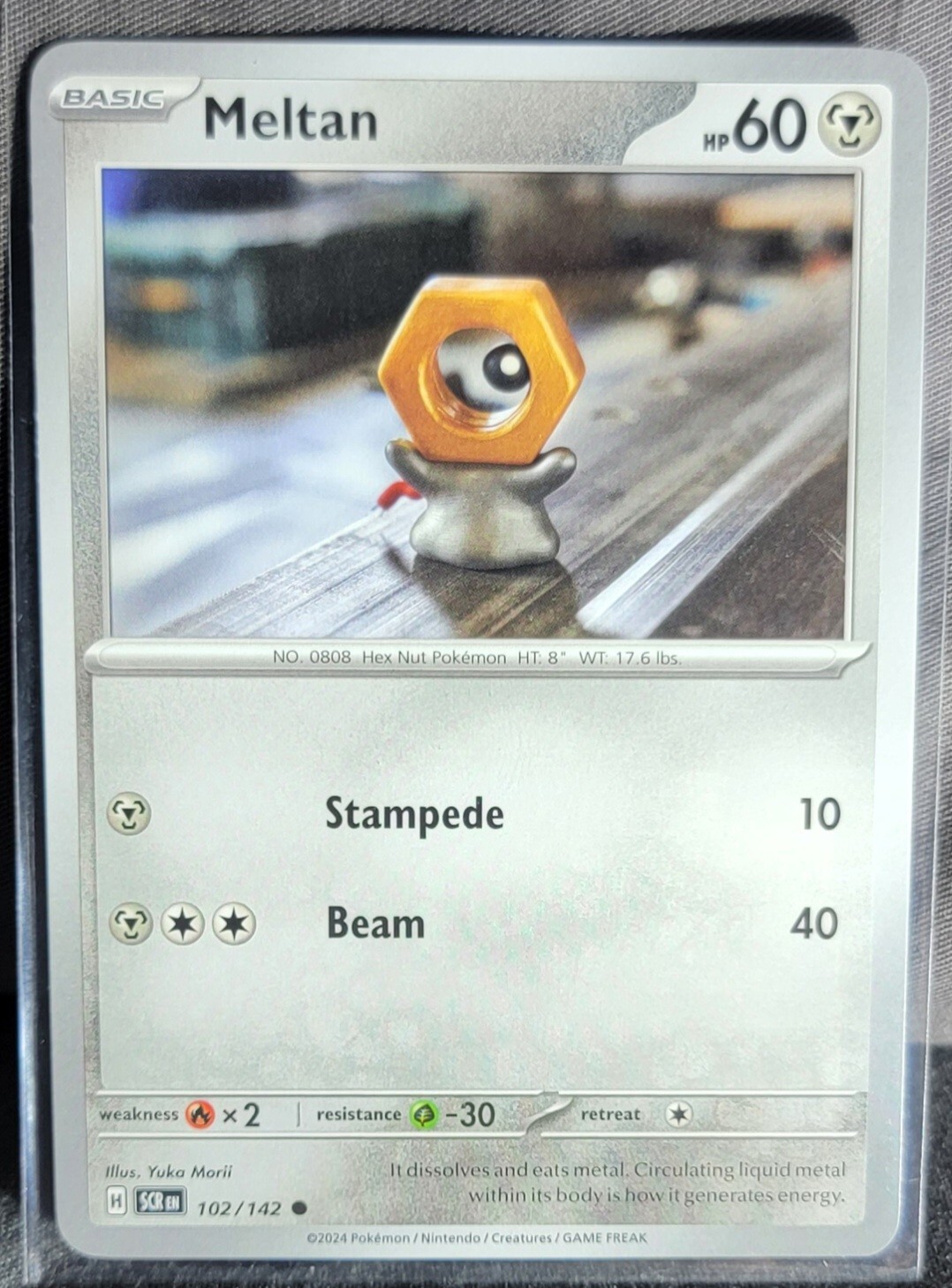Pokemon TCG Card Meltan 102/142 S&V Stellar Crown Common NM 