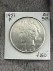 Semi-Key 1927-P PEACE DOLLAR. Looks Choice with nice luster and perfect rims.