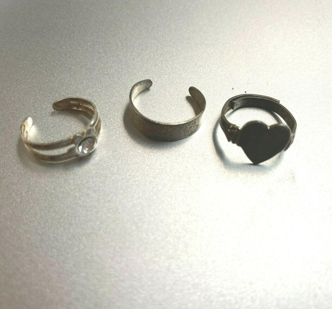 Three Adjustable Silver Tone Toe Rings - image 1