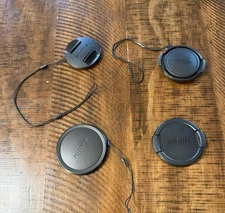 4 Pcs Of Camera Lens Caps Mix Brands