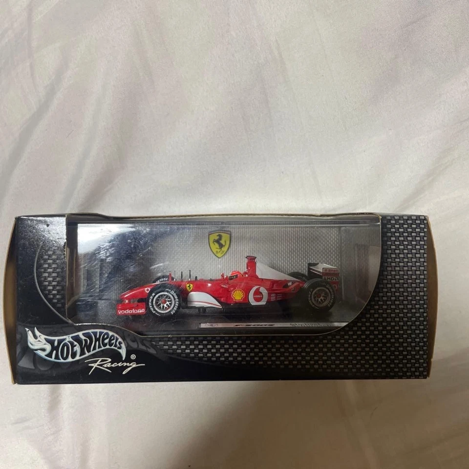 Hot Wheels 1/43 Ferrari F2002 Michael Schumacher modellino auto pressofuso - Immagine 2 di 4