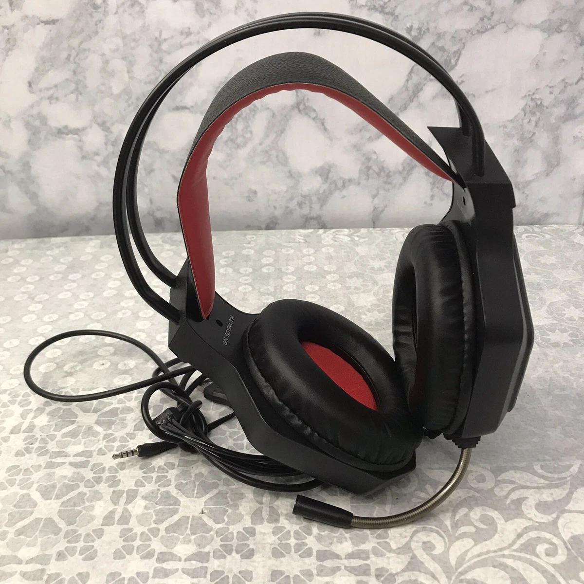 Red and online black gaming headphones