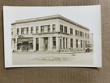 Postcard RPPC Rice Lake WI Wisconsin Main Street Bank Shoe Store Old Car Photo