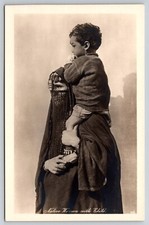 RPPC Egyptian Mother in Native Dress Carrying Child 1920s postcard