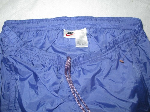 VINTAGE NIKE WOMEN'S WIND PANTS PURPLE 