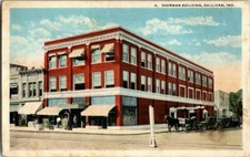 1918. SULLIVAN, IND. SHERMAN BLDG. DOWNTOWN. POSTCARD V21