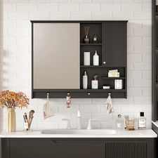 Wall-mounted medicine cabinet with mirrored doors and adjustable shelves