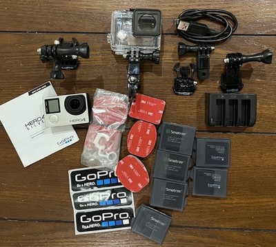 GoPro HERO4 Action Camera Silver 7 Batteries Charger and ACC. NO SIM POWERS ON