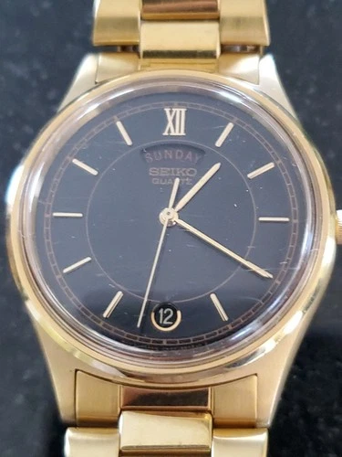 Vintage Men’s Seiko Watch Gold Tone Case Black Dial With Date NEW BATTERY