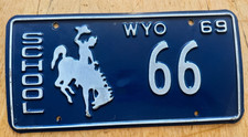 1969 WYOMING SCHOOL BUS LICENSE PLATE  " 66 " WY 69  LOW NUMBER BUCKING BRONCO