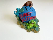 Vintage Planet Hollywood Vinyl Globe Coin Piggy Bank Crocodile and Dinosaur